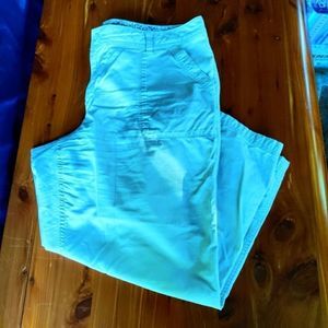 Tan capris with front and rear pockets